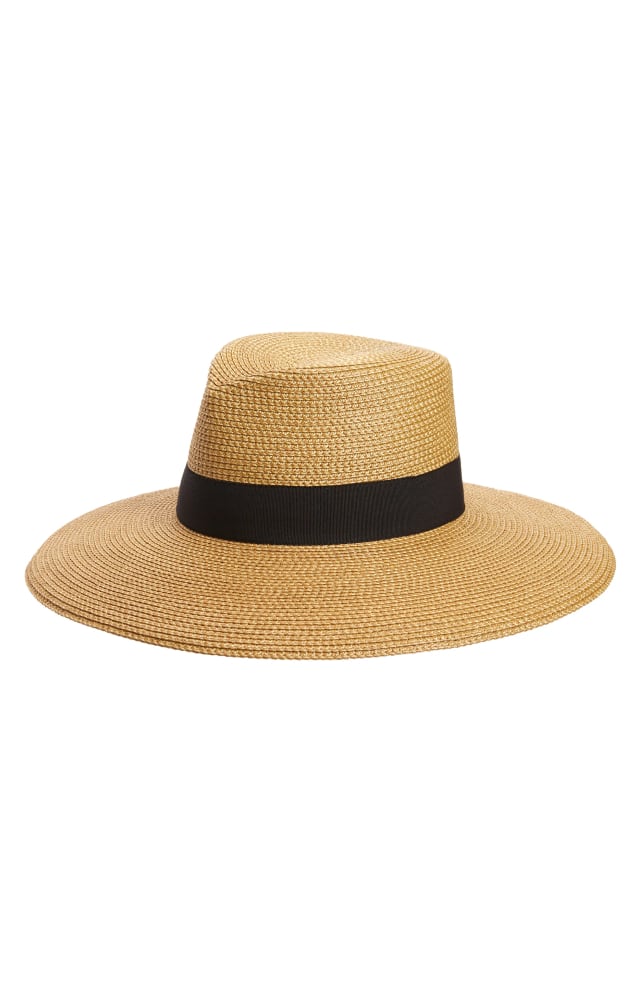 Lack of brand and model information prevents generating SEO-optimized alt text for this straw hat with black band.