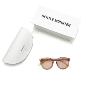 Gentle Monster Bla sunglasses with protective case and branded box, highlighting luxury replica accessories.