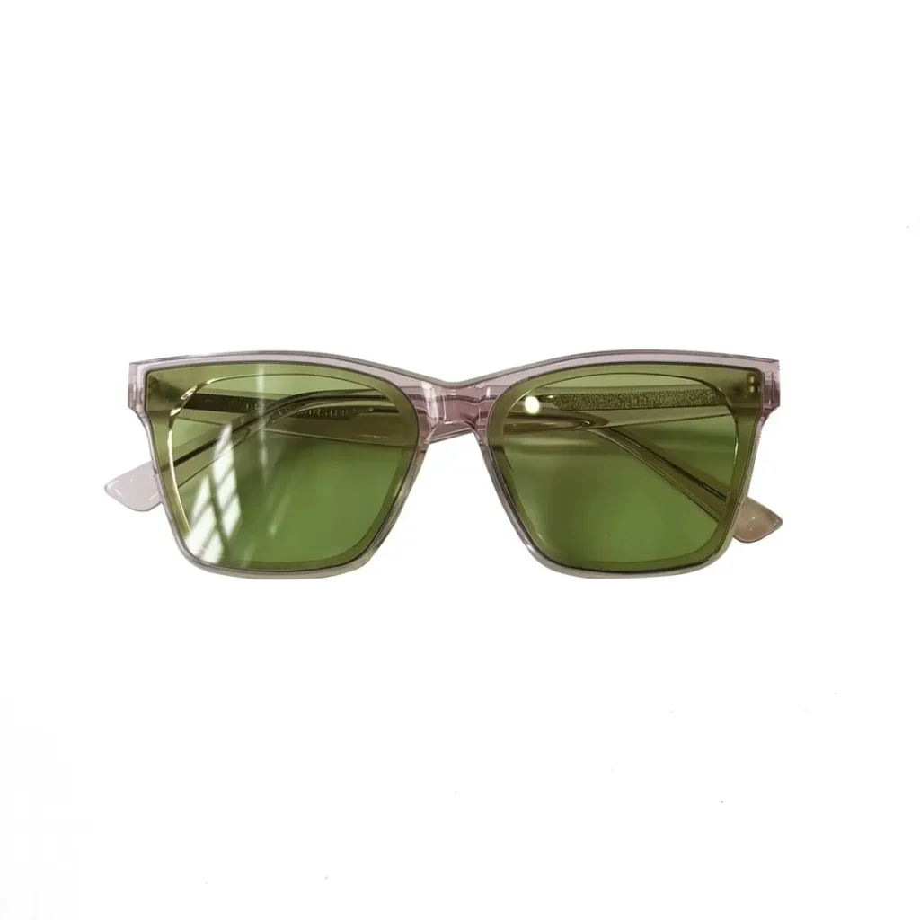 Prada sunglasses translucent pink frame green lenses lightweight design