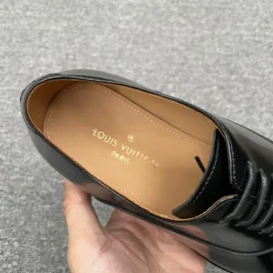 Louis Vuitton leather dress shoe black smooth calfskin lace-up design with tan leather insole
