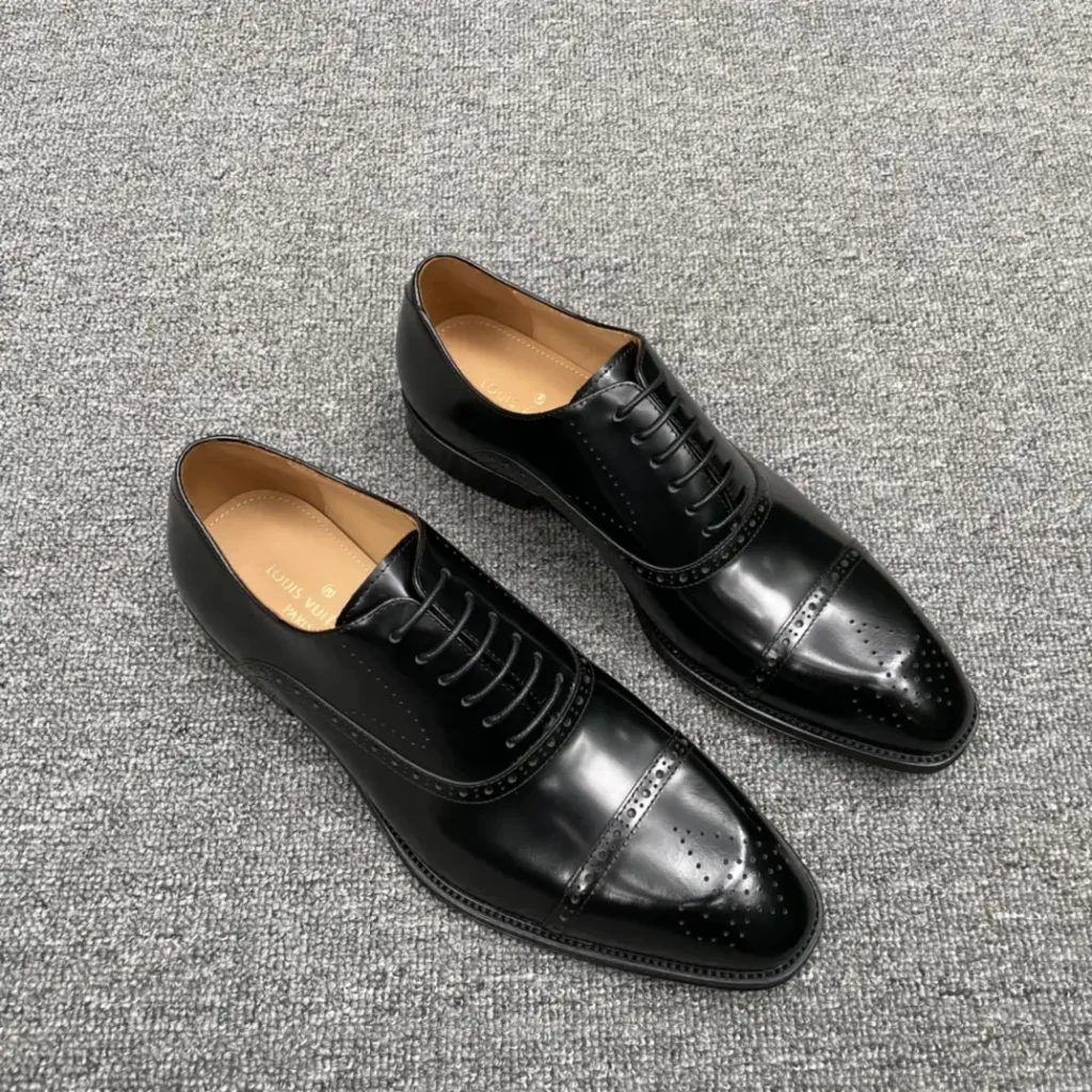 Louis Vuitton dress shoes black leather lace-up brogue detailing formal footwear