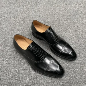 Louis Vuitton dress shoes black leather lace-up brogue detailing formal footwear
