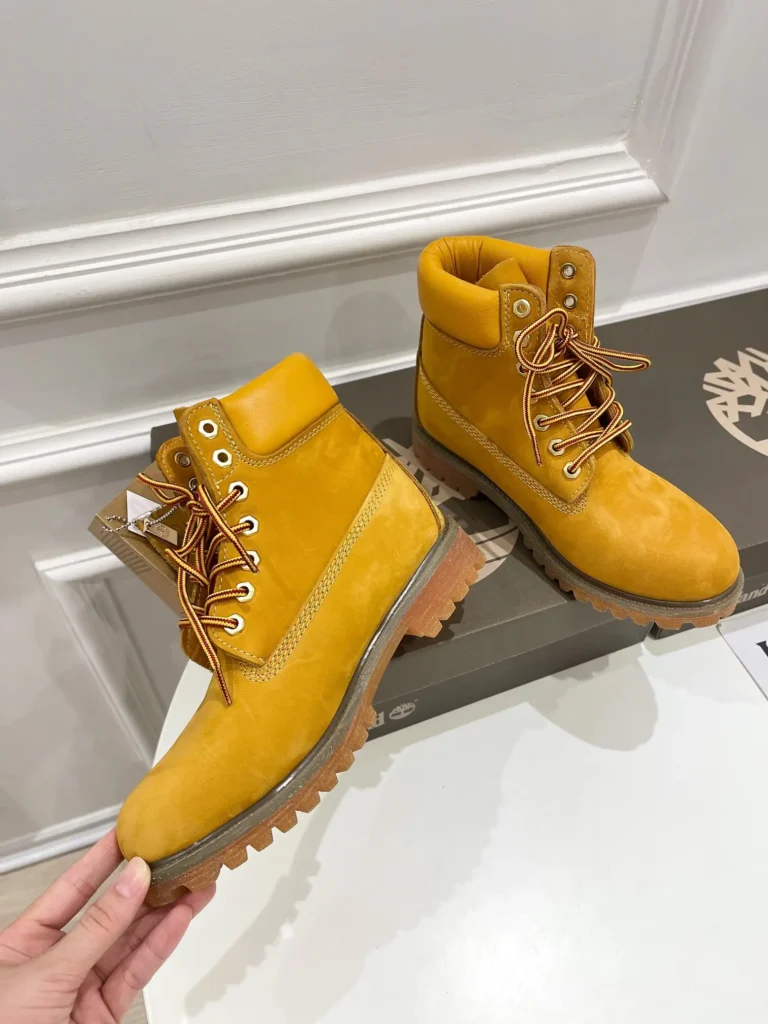 Timberland 6 Inch Premium wheat yellow nubuck leather boots with rubber lug sole and padded collar