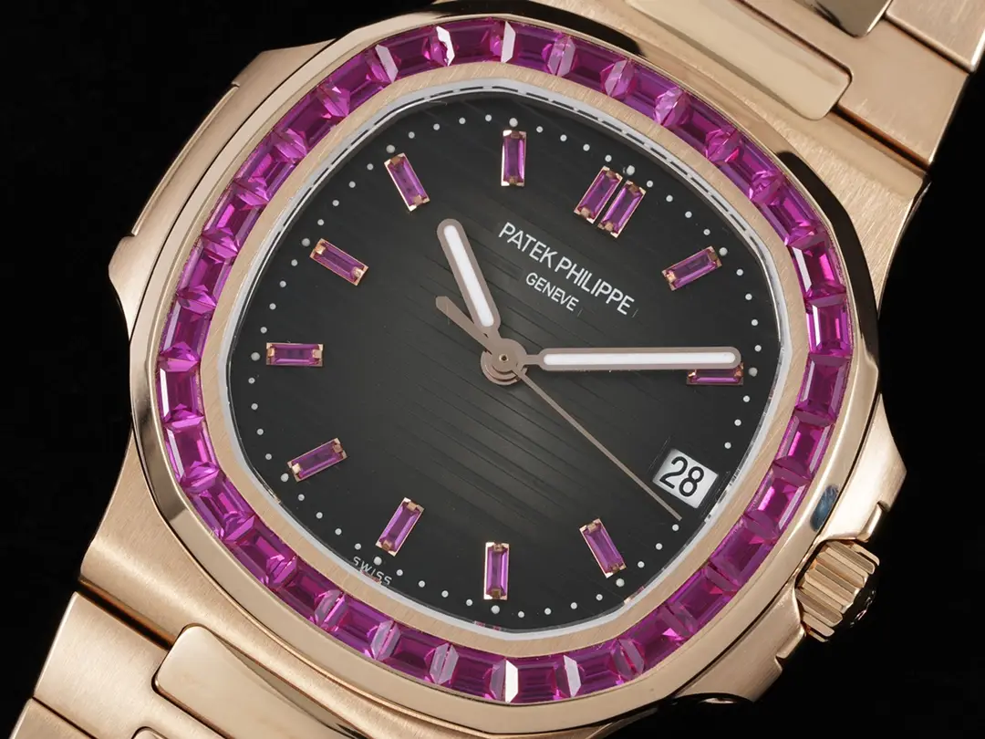 Patek Philippe Nautilus black dial pink sapphire bezel rose gold case watch