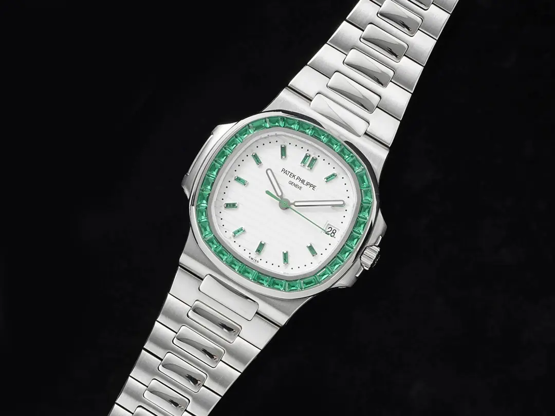 Patek Philippe Nautilus 5711 white dial green gemstone bezel stainless steel watch