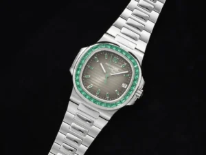 Patek Philippe Nautilus 5711 Diamond Set Limited Edition watch with stainless steel band and emerald accents, showcasing luxury and exquisite craftsmanship.