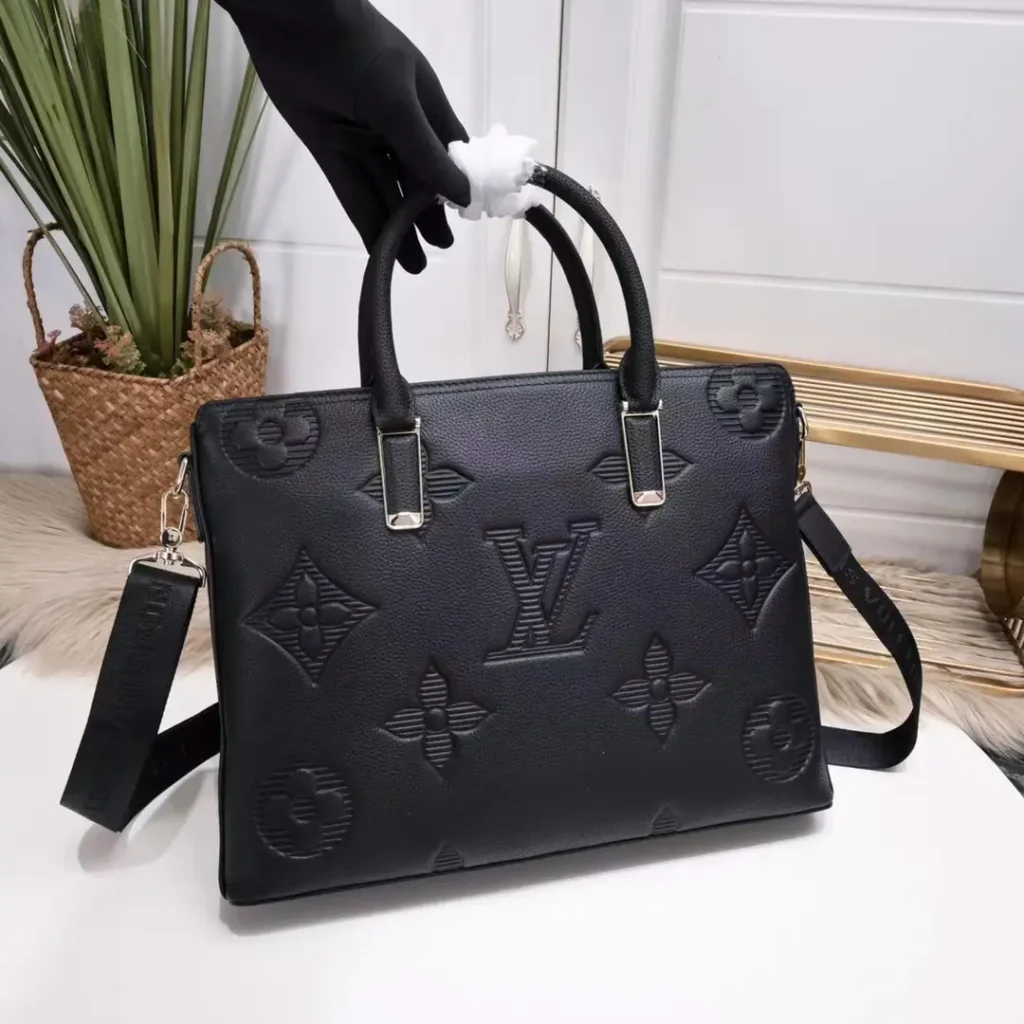 Louis Vuitton Porte-Documents Voyage 15 black embossed leather briefcase with detachable strap and silver hardware