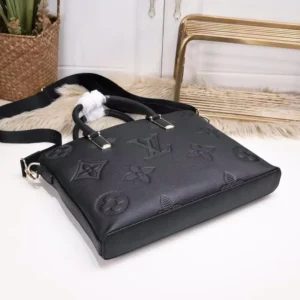 Top notch embossed black leather Louis Vuitton men's handheld bag with adjustable strap, showcasing luxury design and elegant branding.