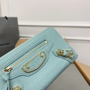 Balenciaga Lake Water Green Classic Retro Zipper wallet featuring gold hardware and zipper details, showcased against a neutral background, emphasizing its luxury design and craftsmanship.
