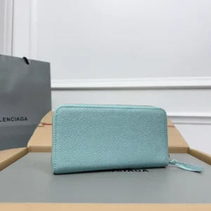 Balenciaga Lake Water Green Classic Retro Zipper wallet displayed on a neutral background with branding elements, showcasing its sleek design and texture.