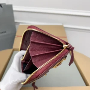 Balenciaga Hourglass Small Wallet burgundy leather zip-around coin purse gold-tone hardware