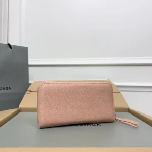 Balenciaga zipped wallet medium size pink pebbled leather with leather zipper pull tab