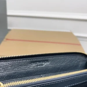Balenciaga leather wallet black color with gold zipper high-quality textured material