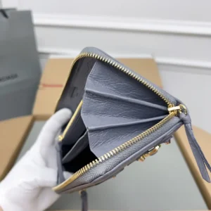 Chloé wallet medium blue leather zip-around design with gold-tone zipper and interior card slots