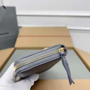 Saint Laurent compact wallet gray leather gold-tone zipper pull wristlet accessory