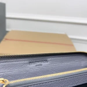 Balenciaga clutch bag small gray leather gold zipper luxury accessory Paris embossed logo