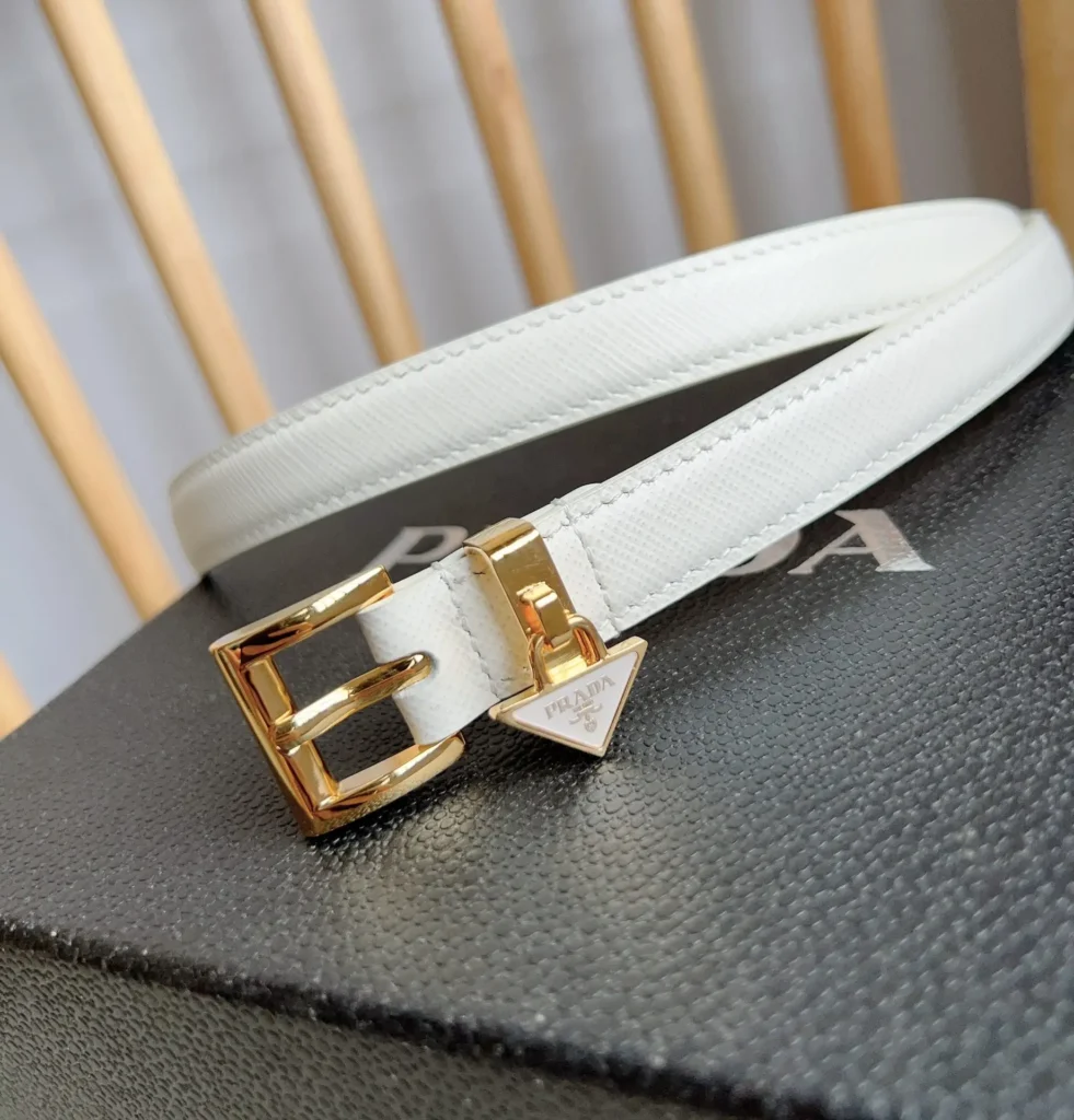 Prada belt white saffiano leather gold-tone buckle with triangular logo charm accessory