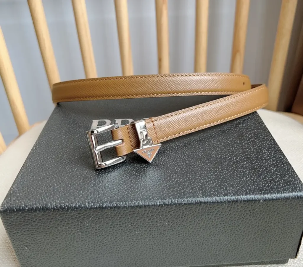 Prada leather belt tan with silver-tone buckle and triangle logo charm accessory
