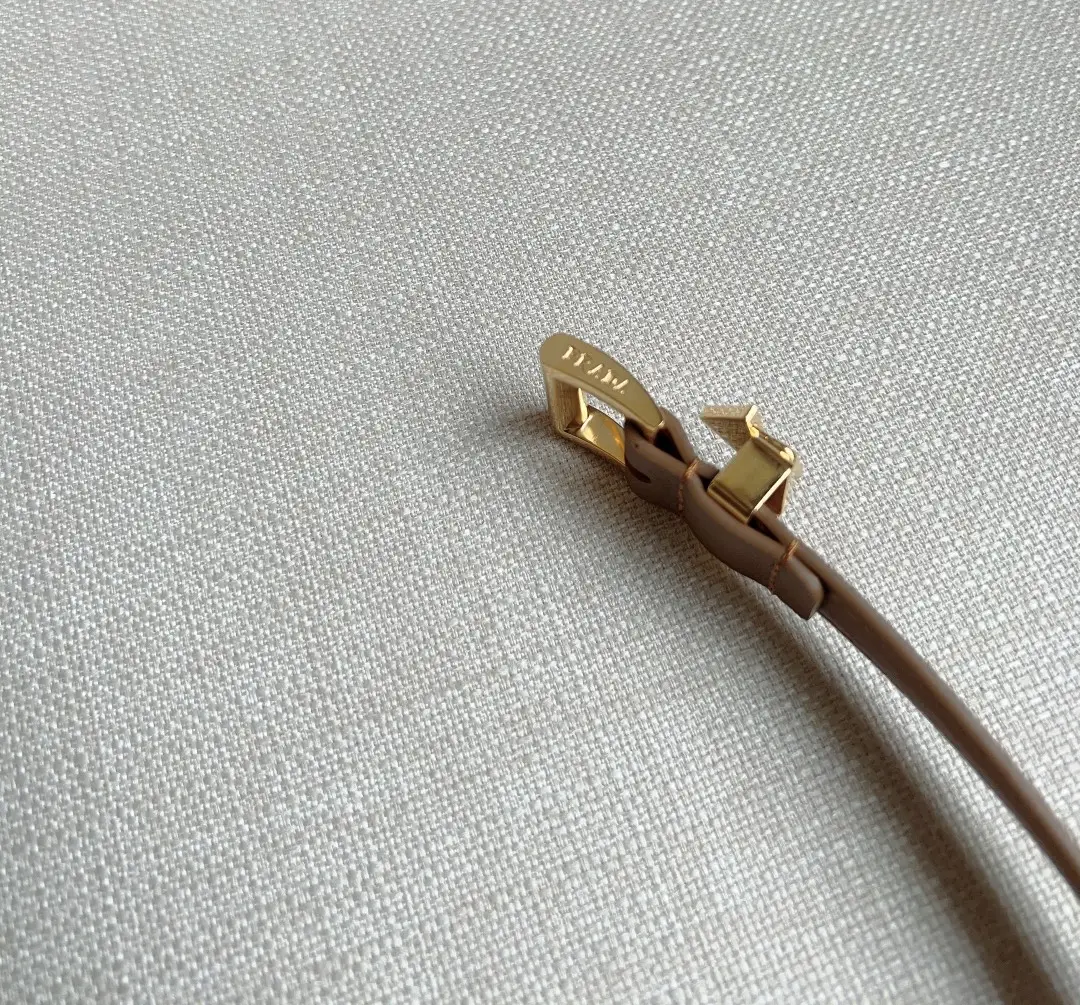 Hermès bracelet beige leather strap gold-tone buckle accessory