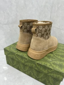 Gucci shearling ankle boots beige suede GG canvas trim rubber sole winter footwear