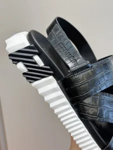Hermes sandals black crocodile leather straps white textured rubber platform sole shoes