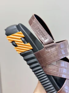 Hermes Oran sandals brown croc embossed leather with black ribbed sole and orange logo detail