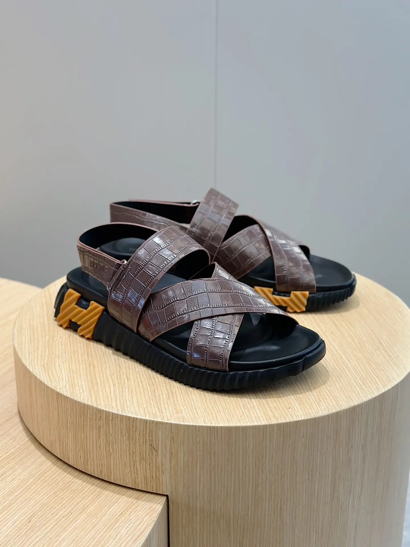 Hermes sandals brown crocodile leather black rubber sole sandals with yellow accents