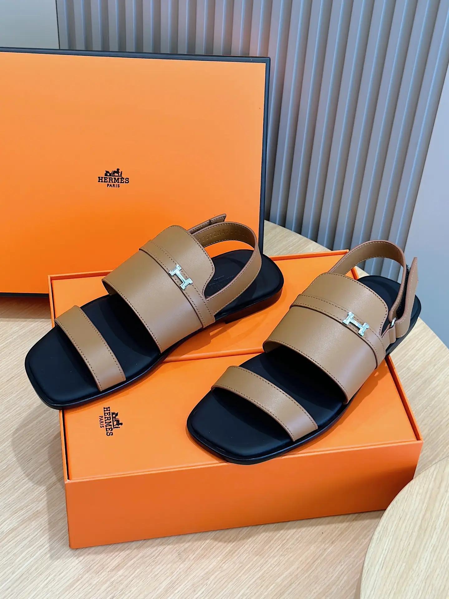 Hermes Oran sandals tan leather black sole silver H logo buckle summer footwear