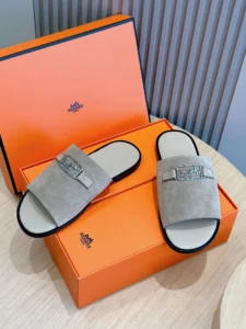 Hermes leather slides grey suede upper silver buckle detailing luxury sandals