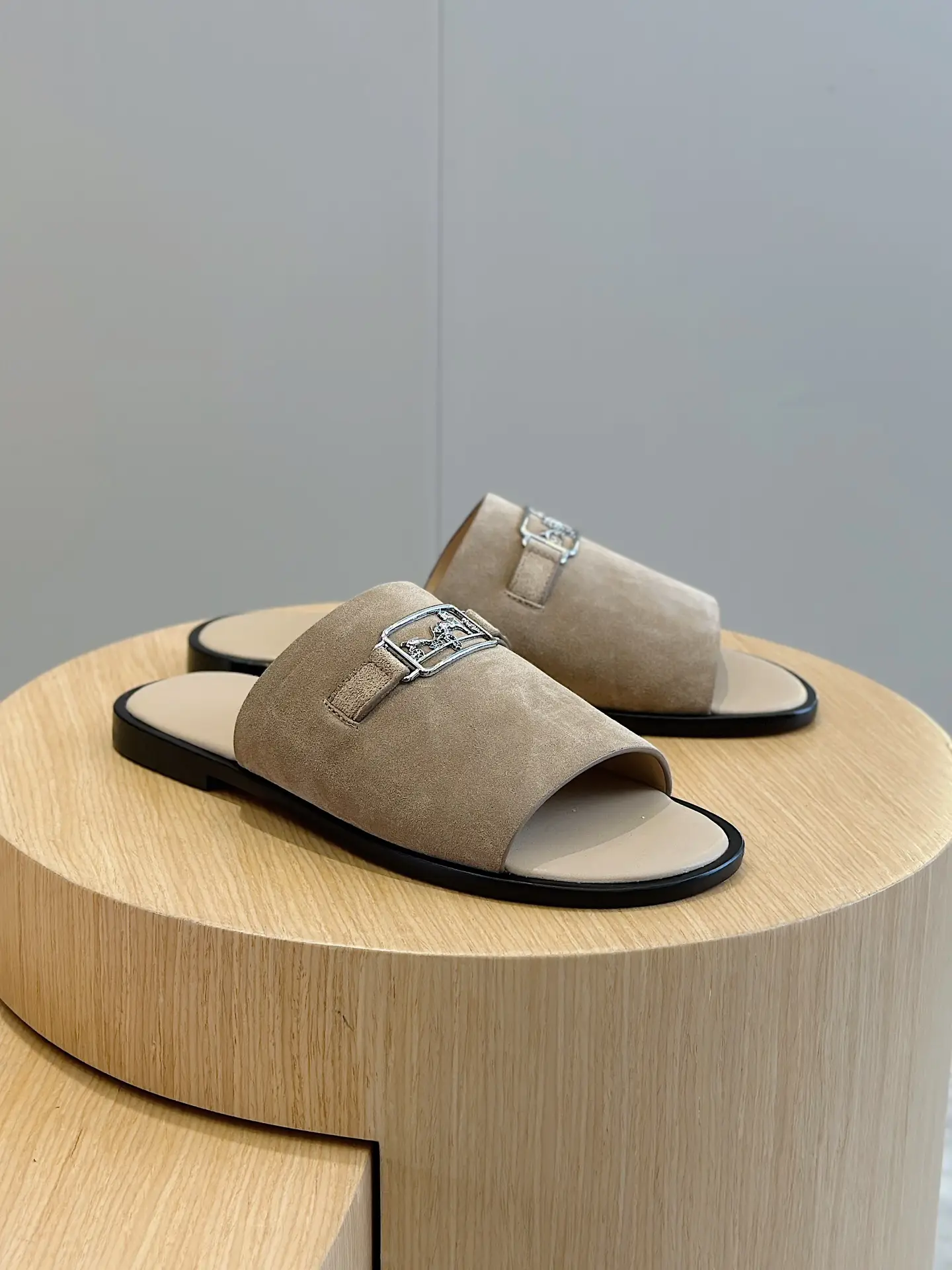 Hermès Oran sandals beige suede leather slides with silver horsebit buckle detail