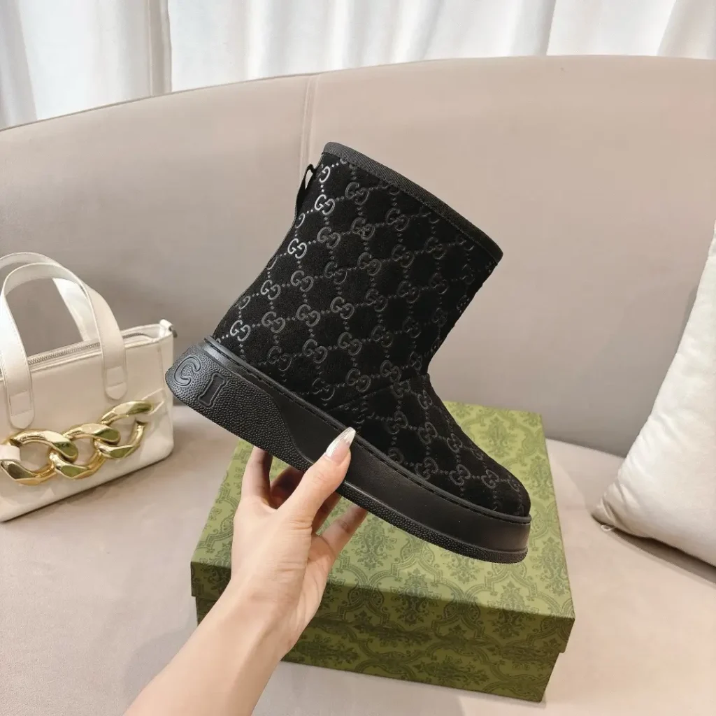 Gucci GG Boot black velvet ankle boots with rubber sole and embossed GG pattern