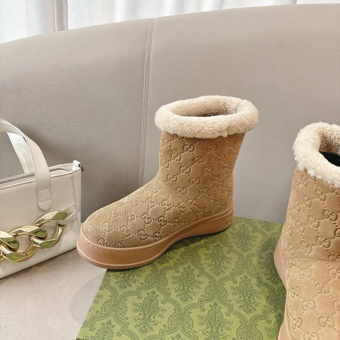 Gucci shearling boot beige Suede material with embossed GG logo and plush wool lining
