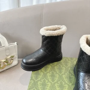 Gucci leather embossed shearling-lined winter boots black warm plush interior