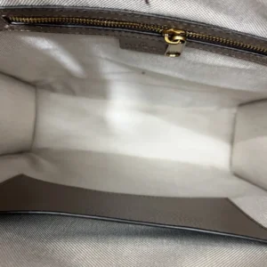 Interior view of Gucci Ophidia Gold Label Logo Canvas Tote bag, showing spacious, lined compartment with zipper closure and gold hardware.