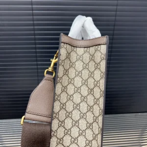 Gucci Ophidia Gold Label Logo Canvas tote bag featuring signature GG monogram and leather accents, designed for versatile use as a shoulder or crossbody bag.