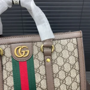 Gucci Ophidia Gold Label Logo Canvas Tote Bag with leather decoration, featuring the iconic GG logo and green-red-green stripe.