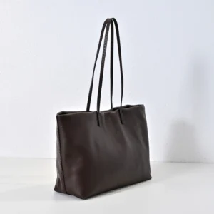Therow Nuance Sheepskin Tote Bag in dark brown leather, featuring minimalist design and two shoulder straps, showcasing low-key luxury appeal.