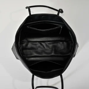 Interior view of the Therow Nuance Sheepskin Tote Bag, featuring soft lambskin material, minimalist design, and multiple compartments for organization.