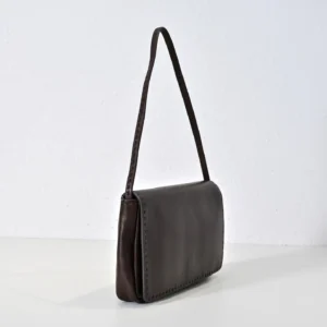 Therow Nuance Sheepskin Tote Bag in dark brown leather, minimalist design, soft texture, elegant shoulder strap, showcased on a neutral background.