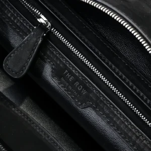 The Row bag black leather interior zipper pouch made in Italy detail