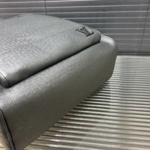 Louis Vuitton printed backpack showcasing high-quality craftsmanship and sleek design, emphasizing luxury replica features.