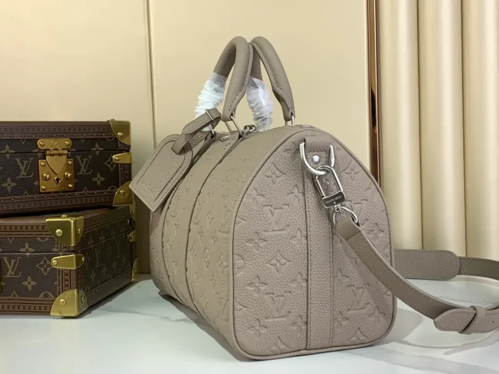 Louis Vuitton Speedy 25 M57779 taupe embossed leather handbag with silver hardware and detachable strap