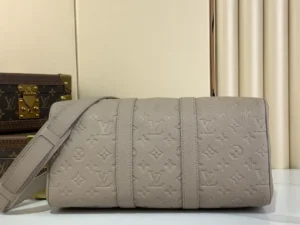Louis Vuitton Duo Soft PM M55661 taupe embossed leather crossbody bag with adjustable strap