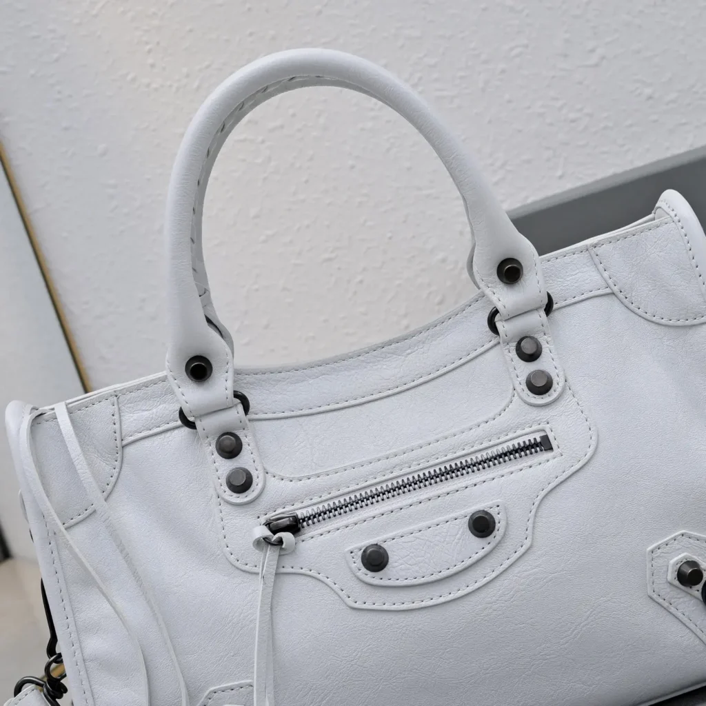 Balenciaga Classic City Medium 102367 white leather handbag with front zip pocket and rolled handles