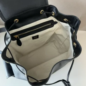 Miu Miu Mini leather bucket bag black smooth leather with beige fabric interior and gold hardware