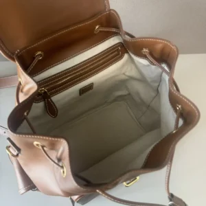 Coach Duffle Bag medium brown leather canvas interior gold hardware drawstring closure