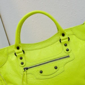 Balenciaga Classic City Medium 203821 neon yellow crinkled leather handbag with front zipper and black hardware
