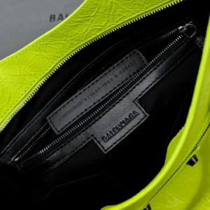 Balenciaga Classic City Medium 671307 neon yellow cracked leather handbag with black leather interior and zipper compartment