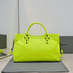 Balenciaga Classic City S neon yellow textured leather handbag with top handles and detachable strap