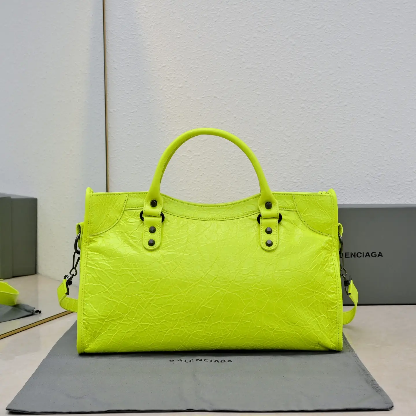 Balenciaga Classic City S neon yellow textured leather handbag with top handles and detachable strap